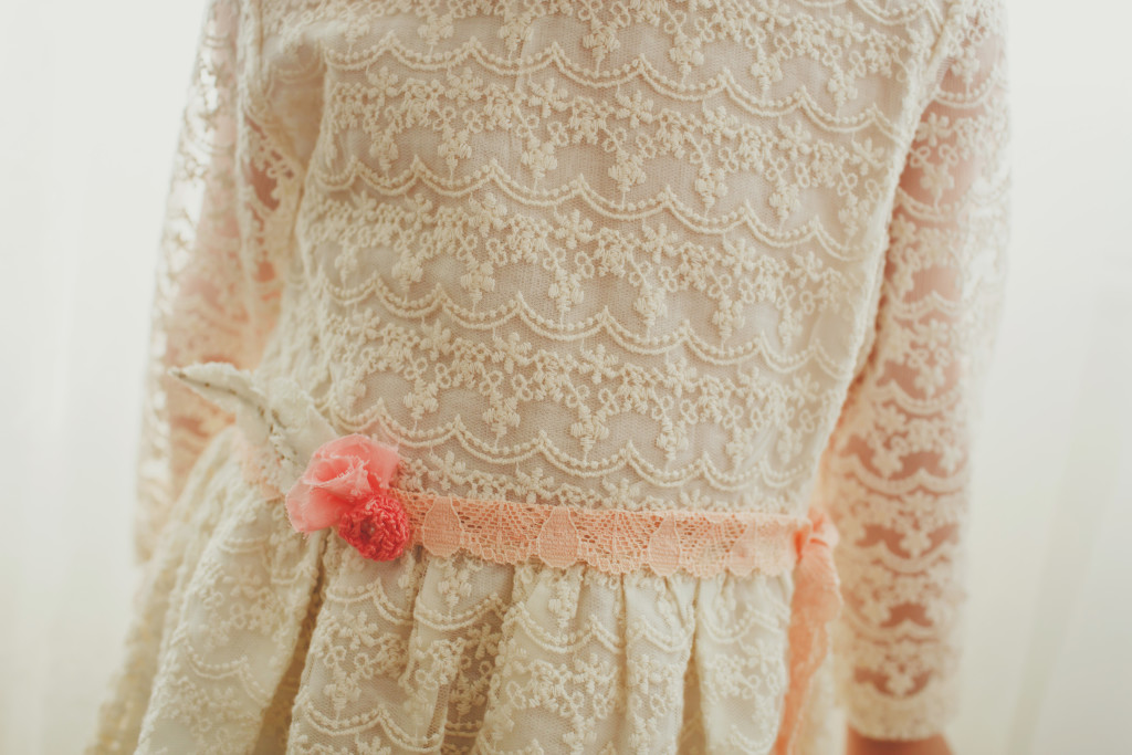 This custom sash made by La La Lace gave this dress the sweetest little pop of color,